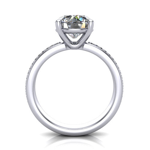 Kamala round classic solitaire engagement ring in 14K White Gold, through-finger front profile showing the round center raised above the channel-set band