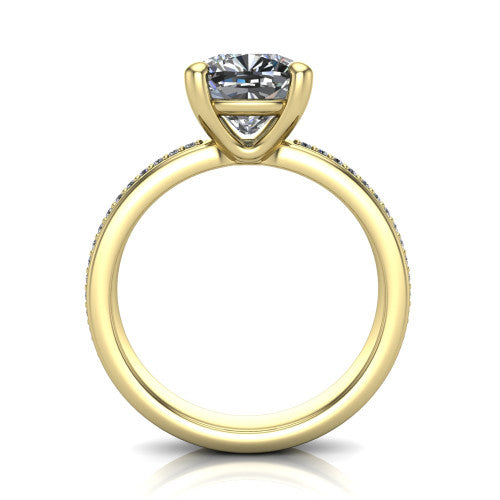 Kamala cushion classic solitaire engagement ring in 18K Yellow Gold, through-finger front profile showing the cushion center raised above the channel-set band