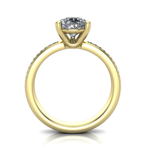 Kamala pear classic solitaire engagement ring in 14K Yellow Gold, through-finger front profile showing the pear center raised above the channel-set band