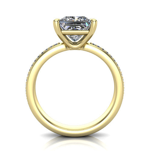 Kamala princess classic solitaire engagement ring in 14K Yellow Gold, through-finger front profile showing the princess center raised above the channel-set band