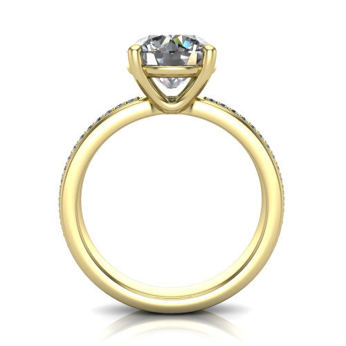 Kamala round classic solitaire engagement ring in 14K Yellow Gold, through-finger front profile showing the round center raised above the channel-set band