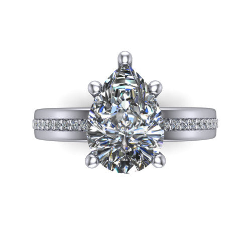 Kamala pear classic solitaire engagement ring in Platinum, top-down view showing the four-prong pear center and the channel row of diamonds down the band