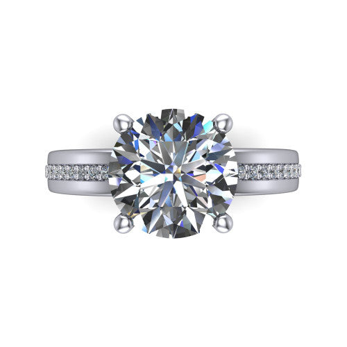 Kamala round classic solitaire engagement ring in Platinum, top-down view showing the four-prong round center and the channel row of diamonds down the band