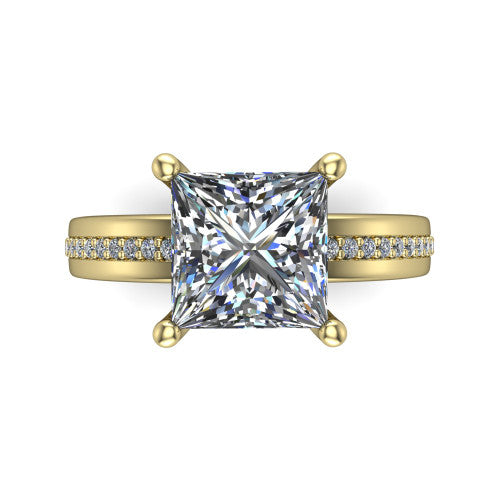 Kamala princess classic solitaire engagement ring in 18K Yellow Gold, top-down view showing the four-prong princess center and the channel row of diamonds down the band