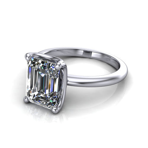 Josie emerald east-west solitaire engagement ring in 18K White Gold with plain band, three-quarter perspective view