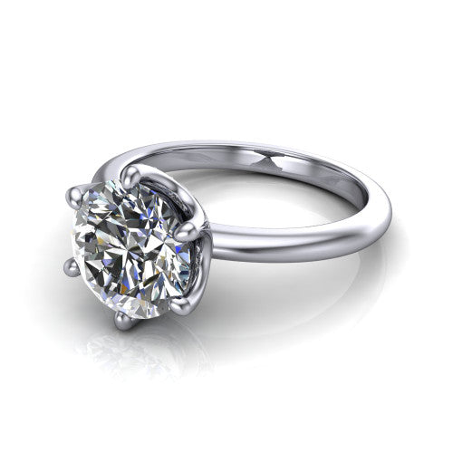 Josie round east-west solitaire engagement ring in Platinum with plain band, three-quarter perspective view