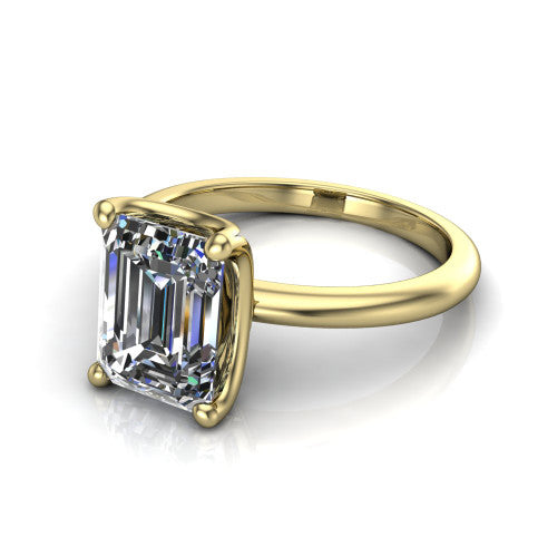 Josie emerald east-west solitaire engagement ring in 14K Yellow Gold with plain band, three-quarter perspective view