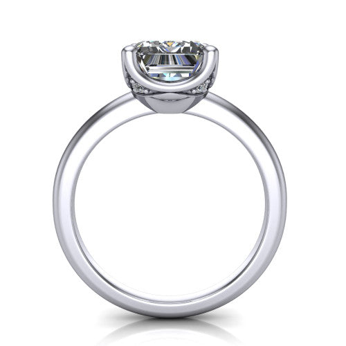 Josie emerald east-west solitaire engagement ring in 18K White Gold with plain band, through-finger front profile showing the peek-a-boo accent