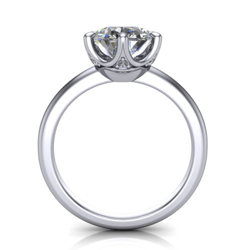 Josie round east-west solitaire engagement ring in Platinum with plain band, through-finger front profile showing the peek-a-boo accent