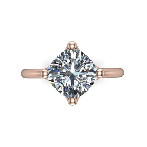 Josie cushion east-west solitaire engagement ring in 18K Rose Gold with plain band, top-down view of the east-west four-prong head