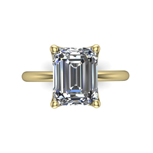Josie emerald east-west solitaire engagement ring in 14K Yellow Gold with plain band, top-down view of the east-west four-prong head