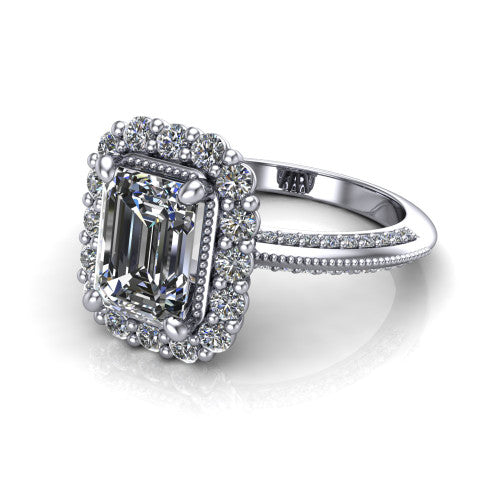Lily emerald vintage double halo engagement ring in 14K White Gold, three-quarter perspective showing the emerald center in a squared double pav&eacute; halo above a pav&eacute; split shank