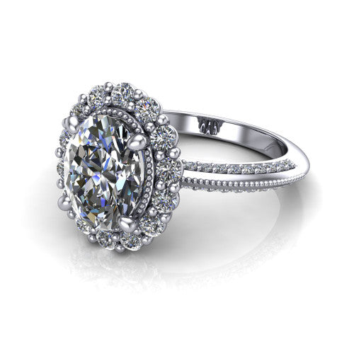 Lily oval vintage double halo engagement ring in Platinum, three-quarter perspective showing the oval center in a squared double pav&eacute; halo above a pav&eacute; split shank