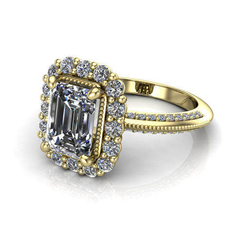 Lily emerald vintage double halo engagement ring in 14K Yellow Gold, three-quarter perspective showing the emerald center in a squared double pav&eacute; halo above a pav&eacute; split shank