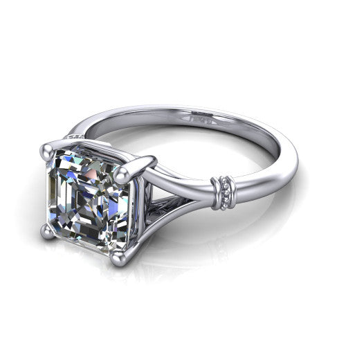 Luna square emerald classic solitaire engagement ring in 14K White Gold, three-quarter perspective showing the square emerald center on claw prongs above a plain split shank with pav&eacute; accent collars