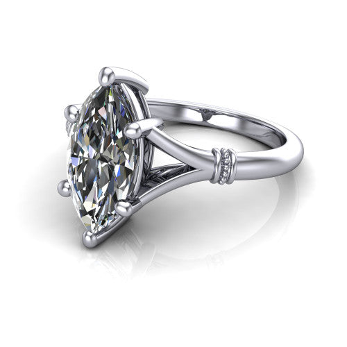 Luna marquise classic solitaire engagement ring in 18K White Gold, three-quarter perspective showing the marquise center on claw prongs above a plain split shank with pav&eacute; accent collars