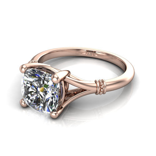 Luna cushion classic solitaire engagement ring in 14K Rose Gold, three-quarter perspective showing the cushion center on claw prongs above a plain split shank with pav&eacute; accent collars
