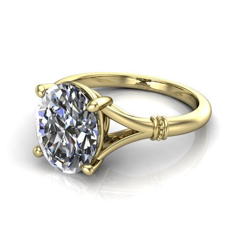 Luna oval classic solitaire engagement ring in 14K Yellow Gold, three-quarter perspective showing the oval center on claw prongs above a plain split shank with pav&eacute; accent collars