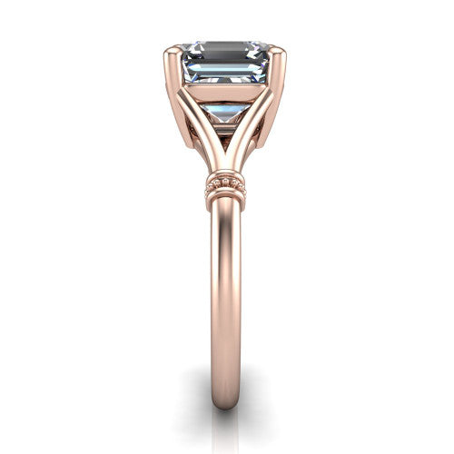 Luna square emerald classic solitaire engagement ring in 18K Rose Gold, side profile showing the plain split shank with pav&eacute; accent collars rising to the square emerald center