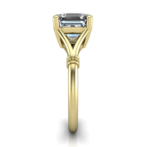 Luna square emerald classic solitaire engagement ring in 14K Yellow Gold, side profile showing the plain split shank with pav&eacute; accent collars rising to the square emerald center