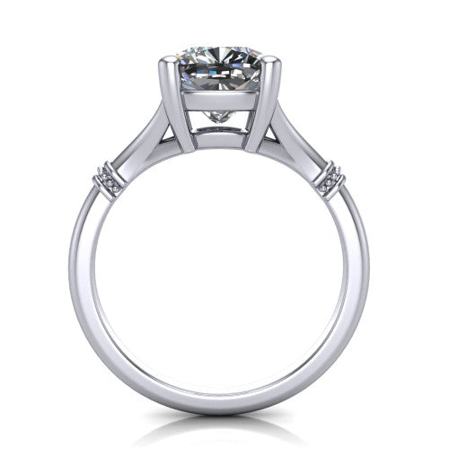 Luna cushion classic solitaire engagement ring in Platinum, through-finger front profile showing the cushion center raised above the plain split shank