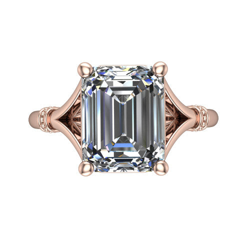 Luna emerald classic solitaire engagement ring in 18K Rose Gold, top-down view showing the four-prong emerald center and the split band with diamond accents