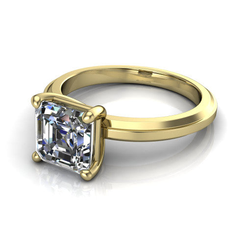 Ellie square emerald classic solitaire engagement ring in 14K Yellow Gold, three-quarter perspective showing the square emerald center on claw prongs above a wide flat knife-edge band