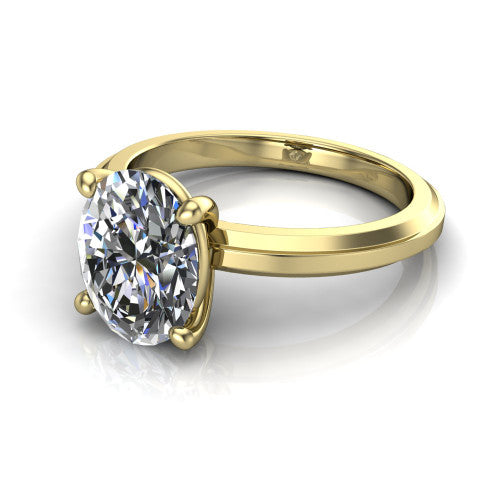 Ellie oval classic solitaire engagement ring in 14K Yellow Gold, three-quarter perspective showing the oval center on claw prongs above a wide flat knife-edge band