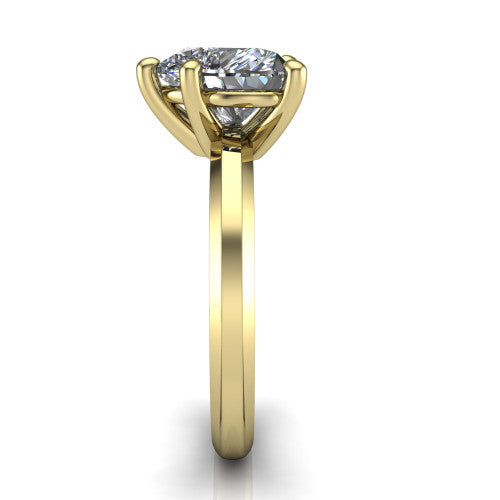 Ellie heart classic solitaire engagement ring in 14K Yellow Gold, side profile showing the substantial knife-edge band and the open basket beneath the heart center
