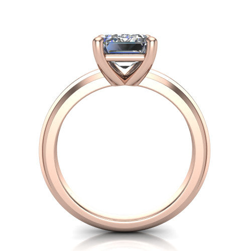 Ellie emerald classic solitaire engagement ring in 18K Rose Gold, through-finger front profile showing the emerald center raised above the wide knife-edge band
