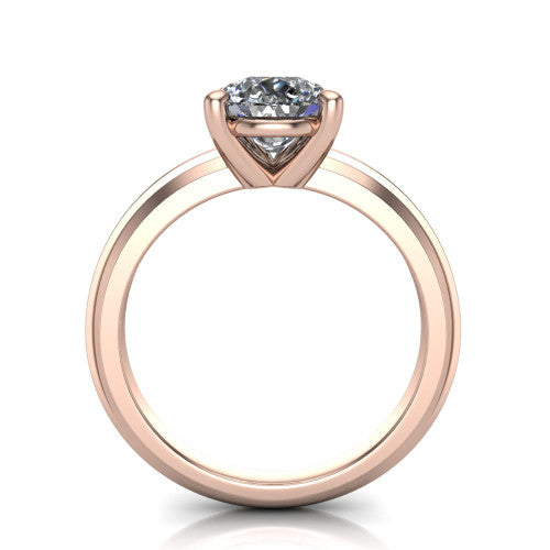 Ellie pear classic solitaire engagement ring in 18K Rose Gold, through-finger front profile showing the pear center raised above the wide knife-edge band