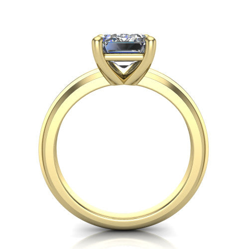 Ellie emerald classic solitaire engagement ring in 14K Yellow Gold, through-finger front profile showing the emerald center raised above the wide knife-edge band