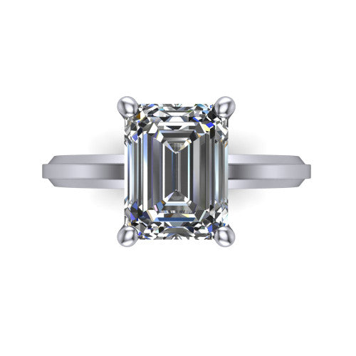 Ellie emerald classic solitaire engagement ring in Platinum, top-down view showing the four-prong emerald solitaire center and the wide band