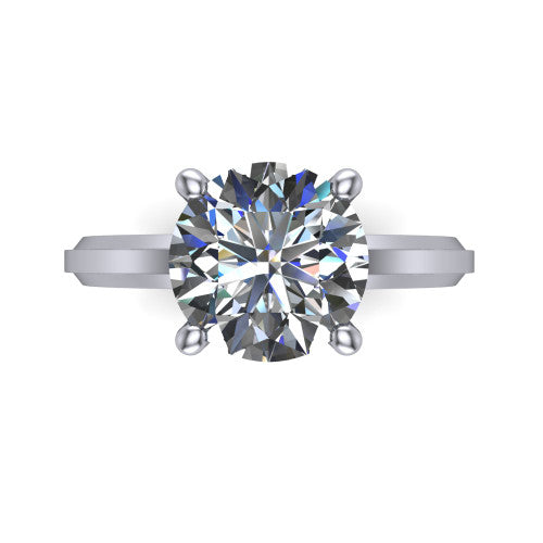 Ellie round classic solitaire engagement ring in 18K White Gold, top-down view showing the four-prong round solitaire center and the wide band