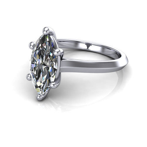Gianna marquise classic solitaire engagement ring in 18K White Gold, three-quarter perspective showing the marquise center on claw prongs above a plain knife-edge band