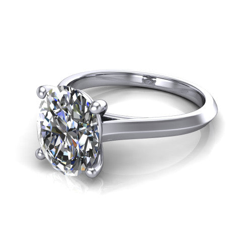 Gianna oval classic solitaire engagement ring in Platinum, three-quarter perspective showing the oval center on claw prongs above a plain knife-edge band