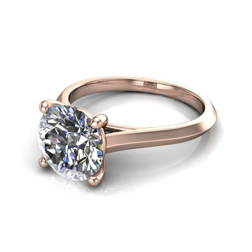 Gianna round classic solitaire engagement ring in 14K Rose Gold, three-quarter perspective showing the round center on claw prongs above a plain knife-edge band