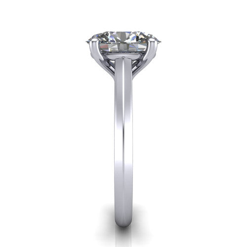Gianna oval classic solitaire engagement ring in Platinum, side profile showing the plain polished knife-edge band and the open basket beneath the oval center
