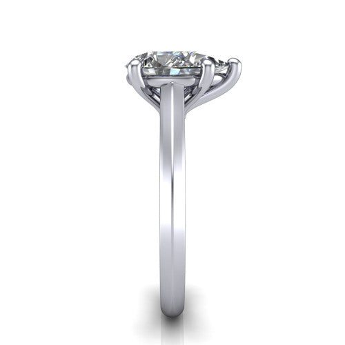 Gianna pear classic solitaire engagement ring in Platinum, side profile showing the plain polished knife-edge band and the open basket beneath the pear center