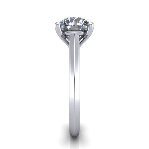 Gianna round classic solitaire engagement ring in 14K White Gold, side profile showing the plain polished knife-edge band and the open basket beneath the round center