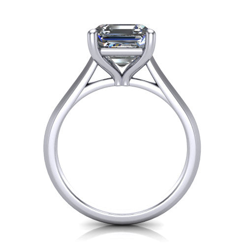 Gianna emerald classic solitaire engagement ring in Platinum, through-finger front profile showing the emerald center raised above the knife-edge band