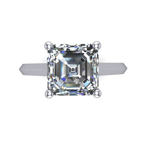 Gianna emerald classic solitaire engagement ring in Platinum, top-down view showing the four-prong emerald solitaire center and the knife-edge band
