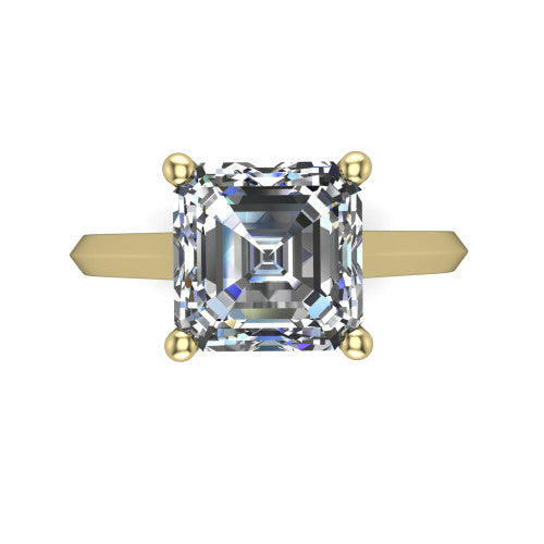 Gianna emerald classic solitaire engagement ring in 18K Yellow Gold, top-down view showing the four-prong emerald solitaire center and the knife-edge band