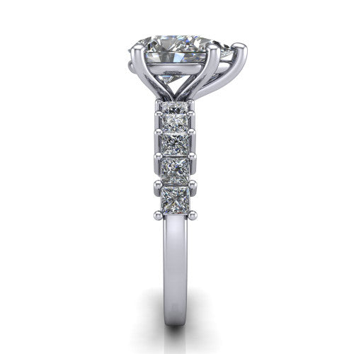 Maya pear classic engagement ring in 18K White Gold, side profile showing the channel-divided princess cut band and the open basket beneath the pear center