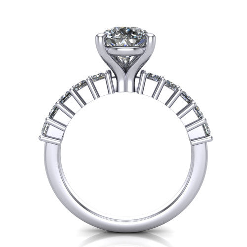 Maya pear classic engagement ring in Platinum, through-finger front profile showing the pear center raised above the bar-set princess cut band