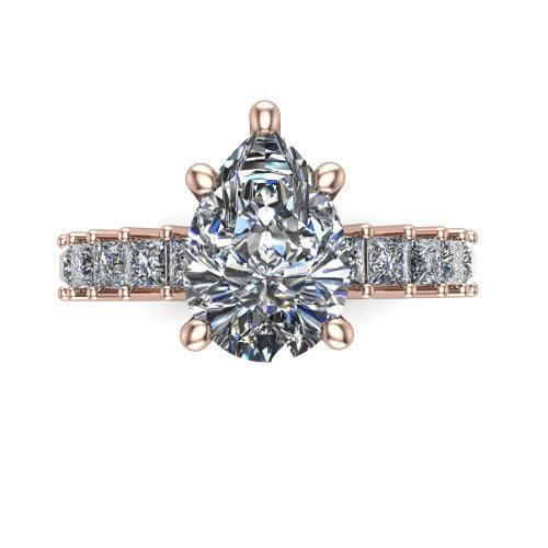 Maya pear classic engagement ring in 14K Rose Gold, top-down view showing the four-prong pear center and the row of princess cut accent diamonds