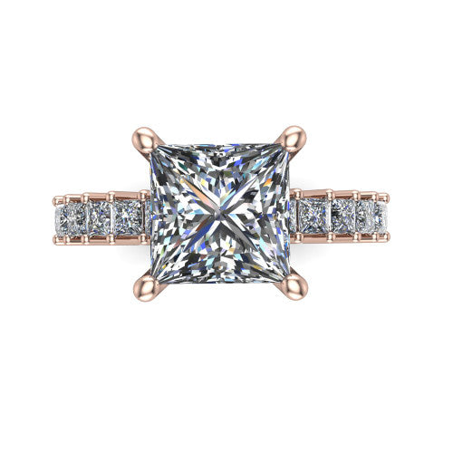 Maya princess classic engagement ring in 18K Rose Gold, top-down view showing the four-prong princess center and the row of princess cut accent diamonds