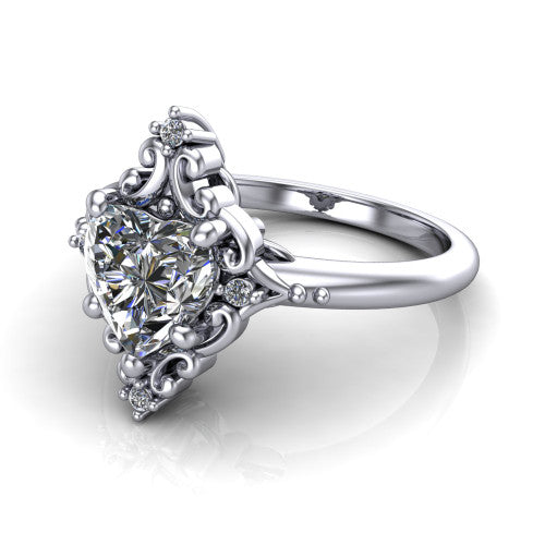 Hazel heart vintage filigree engagement ring in 18K White Gold, three-quarter perspective showing the heart center in an ornate filigree scroll frame above a plain band