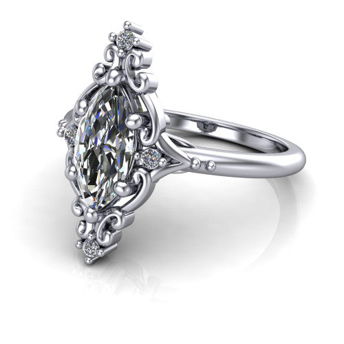 Hazel marquise vintage filigree engagement ring in 18K White Gold, three-quarter perspective showing the marquise center in an ornate filigree scroll frame above a plain band