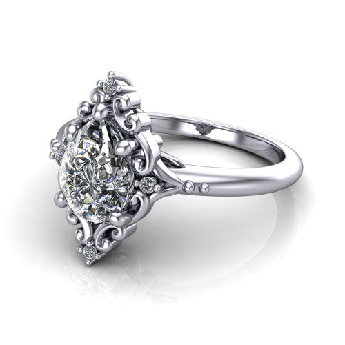 Hazel pear vintage filigree engagement ring in 18K White Gold, three-quarter perspective showing the pear center in an ornate filigree scroll frame above a plain band